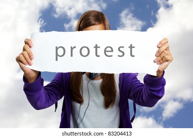 Image of teenage girl in casual clothes expressing protest with sheet of paper