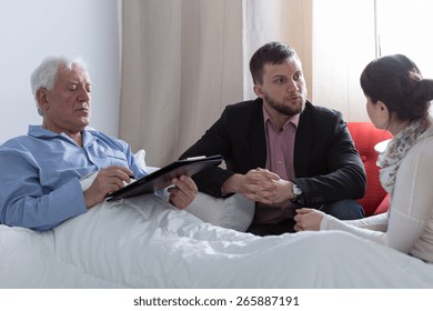 Image Of Terminally Ill Father Making A Will