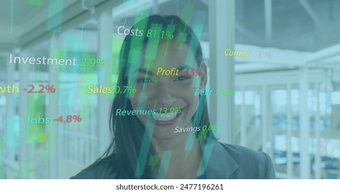 Image of texts, graphs with changing numbers, smiling biracial woman standing in office. Digital composite, multiple exposure, report, growth, portrait, abstract and business concept.