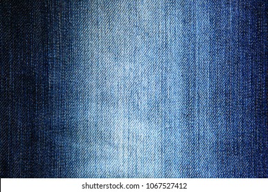 The image of textures of blue denim fabrics for the background.