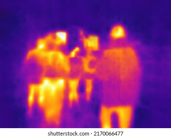The image from thermal imager device. Human heat map. Blurred unrecognizable people. - Shutterstock ID 2170066477