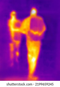 The Image From Thermal Imager Device. Human Heat Map. Blurred Unrecognizable People.