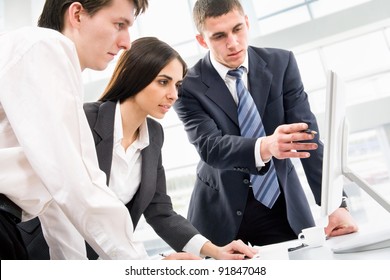 Image Of Three Business People Working At Meeting