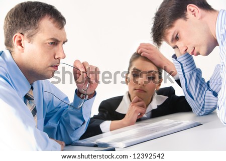 Image of three professionals thinking about business-plan