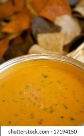 An Image Of Tortilla Chips And Fresh Chili Con Queso