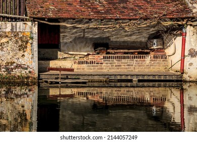 Image Of A Traditional French Laundry On The Riverside Of The River Ozanne In Brou In Central France. 