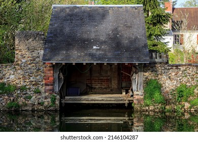 Image Of A Traditional French Laundry On The Riverside Of The River Ozanne In Brou In Central France. 