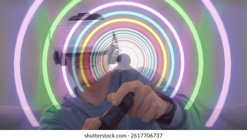 Image of tunnel with neon shapes over caucasian man using vr headset. global technology, social media and digital interface concept digitally generated image. - Powered by Shutterstock - Get 15% off with code: PIKWIZARD15