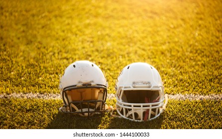 Image Of Two Football Helmets On Stadium