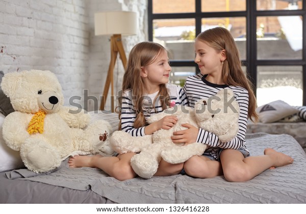 Image Two Little Sisters Sitting On Stock Photo 1326416228 | Shutterstock