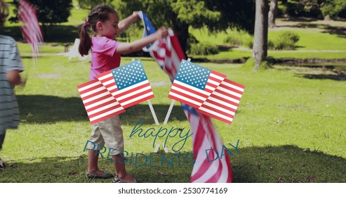 Image of usa flags over happy biracial boy and girl running with flags on grass. presidents day, independence day and american patriotism concept digitally generated image. - Powered by Shutterstock