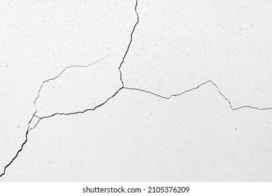 Image for use as a background, diagonally cracked white wall, which is still a small line, not very large. Which the renovation is still easy. - Powered by Shutterstock