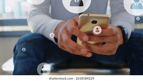 Image of user icons over midsection of caucasian man using smartphone. global connections, social media, technology and digital interface concept digitally generated image.