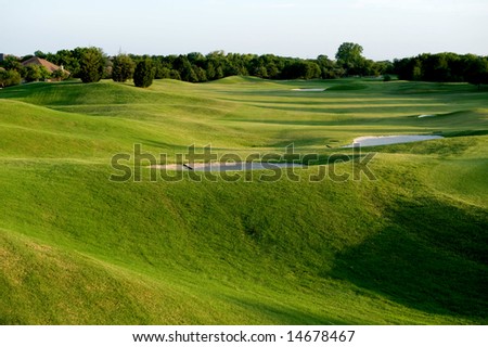 An image of a vibrant green golf course