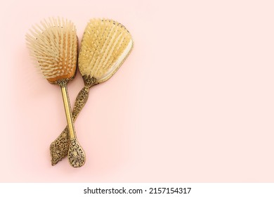 Image Of Vintage Hair Comb Over Pastel Pink Background