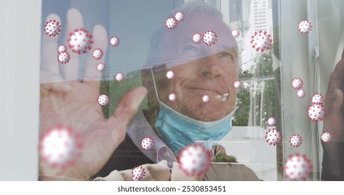 Image of virus cells over happy senior caucasian man with face mask. medical and healthcare services during coronavirus covid 19 pandemic concept digitally generated image. - Powered by Shutterstock