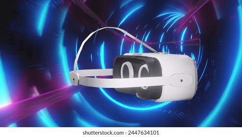 Image of vr headset over tunnel with blue light trails. Global virtual reality, connections, digital interface and data processing concept digitally generated image.