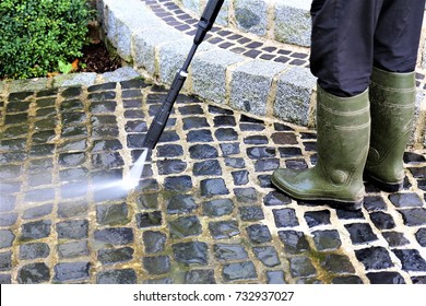An Image of walkway cleaning - high pressure cleaner - Shutterstock ID 732937027
