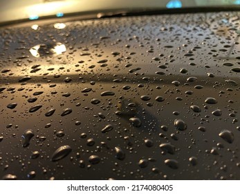 Image Of Water Drops On Black Shiny Reflective Surface