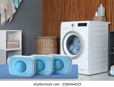 Image Of Water Softener Tablets And Modern Washing Machine In Laundry Room