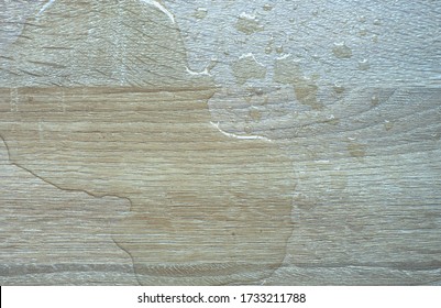 An Image Of A Water Spill On The Top View Wooden Table For Use As A Background Illustration.