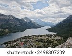 An image of the Waterton townsite looking down Waterton Lake. Glacier National Park, Montana, USA is at the end of the lake. Alberta, Canada.