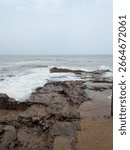 An image of waves making patterns at one of the beaches in Vizag, i.e., Bheemili Beach, which is part of the coastline of the Bay of Bengal in the state of Andhra Pradesh in India.