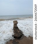 An image of waves making patterns at one of the beaches in Vizag, i.e., Bheemili Beach, which is part of the coastline of the Bay of Bengal in the state of Andhra Pradesh in India.