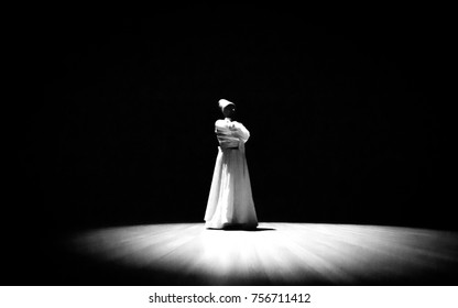 the image of a whirling Dervish in the darkness