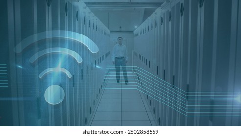 Image of wifi icon over caucasian man working in a server room. digital interface global connections concept digitally generated image.