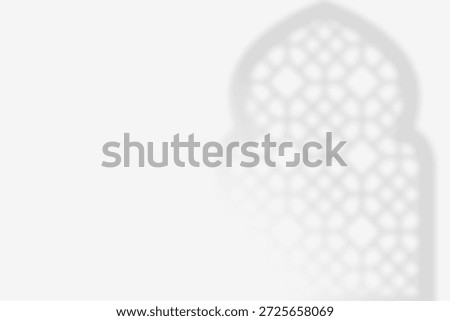 Image of a window shade with a subtle Islamic geometric pattern on a clean white background.
