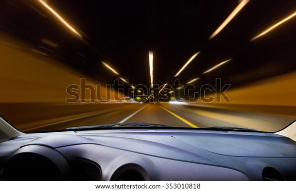 Image of\
windshield ,image of driving fast at night\
.