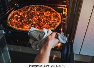 Image Of A Woman Cooking Pizza