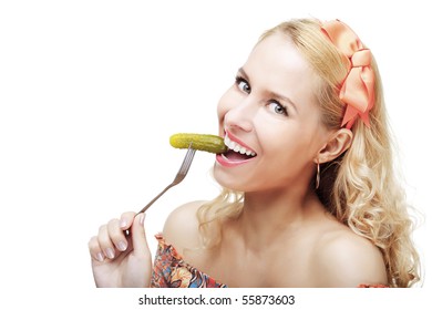 The Image Of A Woman Eats Pickled Cucumber