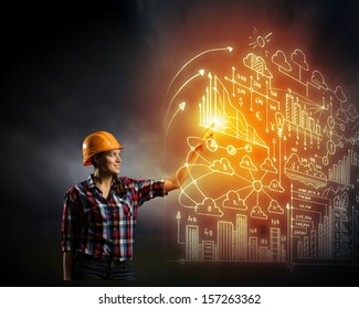 Image of woman in hardhat pushing icon of media screen