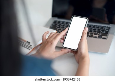 Image. Woman Holding A Smartphone Blank White Screen At The Office.