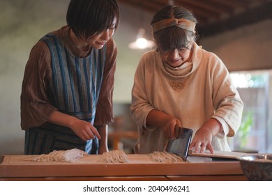 Image Of A Woman Making Soba Noodles 