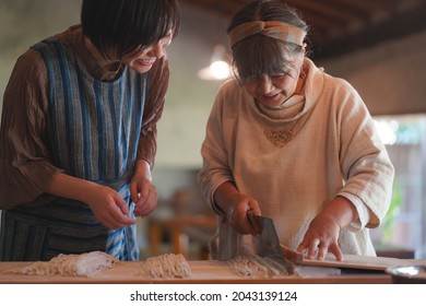 Image Of A Woman Making Soba Noodles 