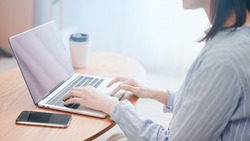 
Image Of A Woman Using A Laptop Computer