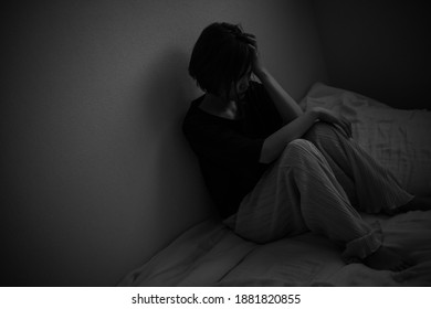 Image of a woman who is sad - Shutterstock ID 1881820855