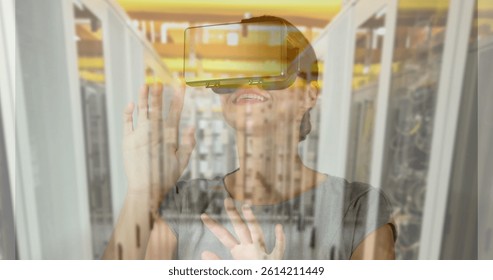 Image of women using vr headset over server room. global connections, business, digital interface, technology and networking concept digitally generated image.