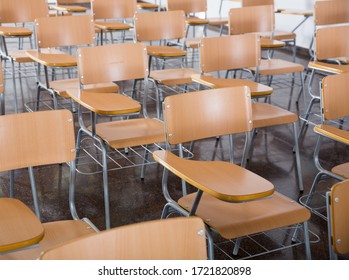 Image Of Wooden Chairs In Rows In Classroom Of School Interior, No People

