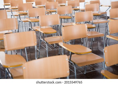 Image Of Wooden Chairs In Rows In Classroom Of School Interior, No People..