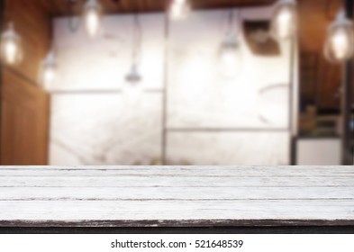 Image Of Wooden Table In Front Of Abstract Blurred Background Of Resturant Lights For Display Or Montage Your Products.