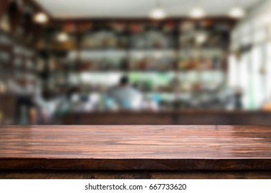 Image Of Wooden Table In Front Of Bar Abstract Blurred Backgroun