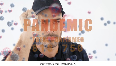 Image of a word pandemic with total confirmed number rising with cells floating over caucasian man. coronavirus covid-19 pandemic concept digital composition