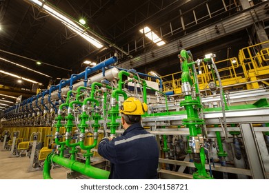 image of worker working in factory closed area - Powered by Shutterstock