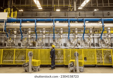 image of worker working in factory closed area - Powered by Shutterstock