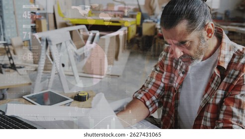 Image of world map and data processing over caucasian male carpenter working in workshop. Global communication, work and digital interface concept digitally generated image. - Powered by Shutterstock - Get 15% off with code: PIKWIZARD15