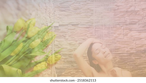 Image of yellow flowers over happy biracial woman washing in shower. Nature, self care, beauty, relaxation, wellbeing and lifestyle, digitally generated image. - Powered by Shutterstock